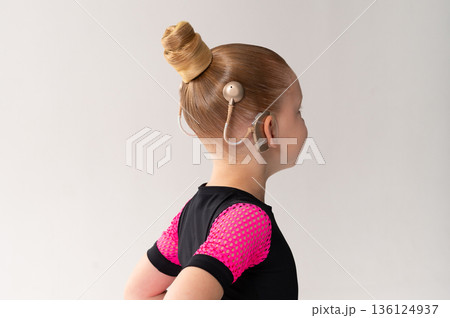 Child head with cochlear implant hearing aid Child head with cochlear implant hearing aid 136124937