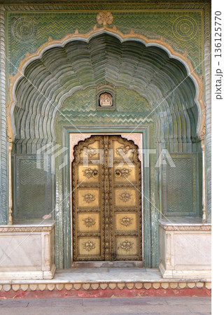 Ornate door at the Chandra Mahal, Jaipur City Palace in Jaipur, Rajasthan, India Ornate door at the Chandra Mahal, Jaipur City Palace in Jaipur, Rajasthan, India 136125770