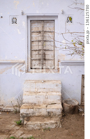 Decrepit door in an old house in Pushkar, India Decrepit door in an old house in Pushkar, India 136125780