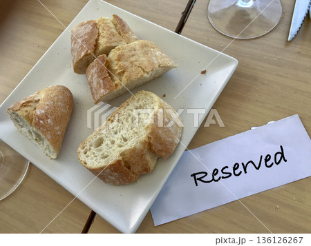 bread on the table with the reserved sign bread on the table with the reserved sign 136126267