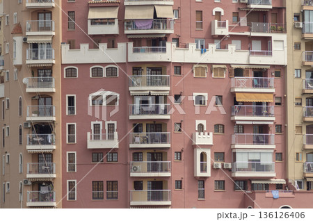 facade of a community with multiple balconies and windows of different sizes facade of a community with multiple balconies and windows of different sizes 136126406