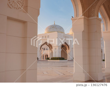 Qasr Al Watan Palace Exterior Architecture Abu Dhabi UAE Description: Magnificent white facade of Qasr Al Watan presidential palace stands under clear blue sky. modern Islamic design in Abu Dhabi. 136127476
