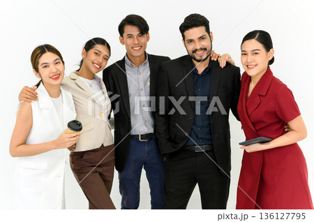 Group portrait of Young Asian Businesspeople standing in a row isolated on white background happy professional team people. looking at camera. 136127795