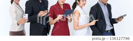 Banner cover design. Close up a group of business people using gadgets or smartphones while standing in a row. isolated on white background. Banner cover design. Close up a group of business people using gadgets or smartphones while standing in a row. isolated on white background. 136127796