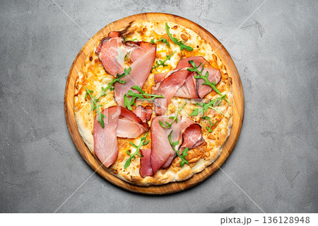 Prosciutto Cheese Pizza with arugula 136128948