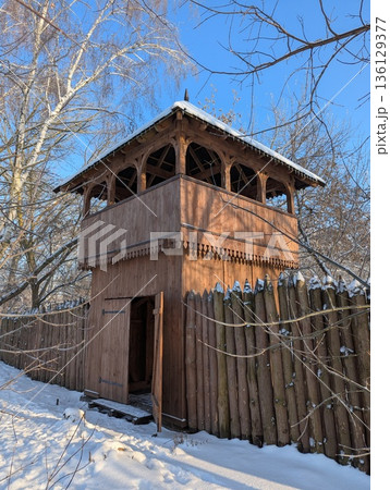 tower of a wooden fortress in the style of medieval architecture, wintertime 136129377