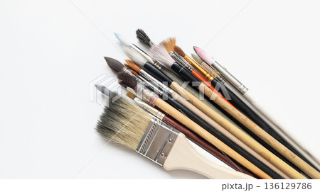 Art brushes isolated on a white background, art supplies set for painting. Calligraphy, squirrel, and synthetic brushes. 136129786