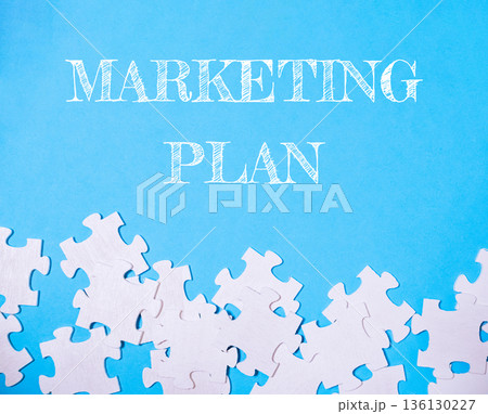 Blue background with white puzzle pieces Blue background with white puzzle pieces 136130227