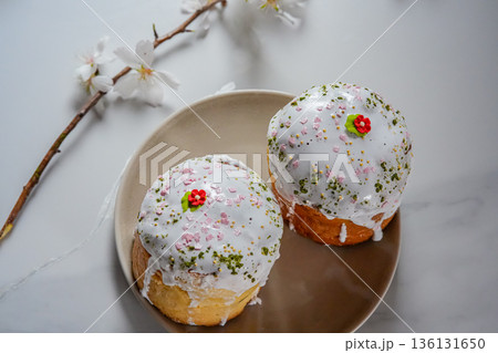 Two Easter Kulich on Plates Top View Two Easter Kulich on Plates Top View 136131650