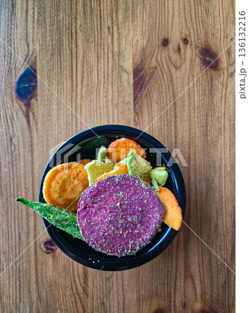 Assorted Gourmet Vegetable Chips in a Bowl Assorted Gourmet Vegetable Chips in a Bowl 136132216