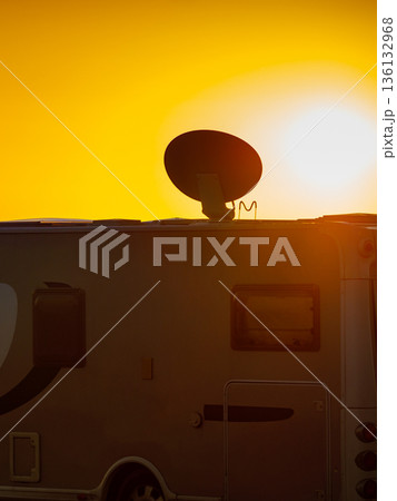 Satellite dish on roof of caravan 136132968