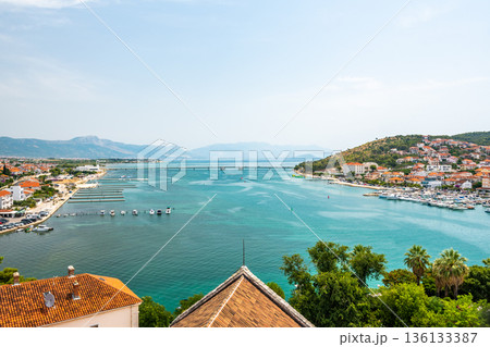Aerial panoramic view of Trogir town, Croatia. Ancient building in old town, view to river and harbor. Aerial panoramic view of Trogir town, Croatia. Ancient building in old town, view to river and harbor. 136133387