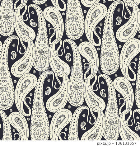 Hand drawn black and cream intricate Paisley silhouette seamless pattern on dark background Hand drawn black and cream intricate Paisley silhouette seamless pattern on dark background 136133657