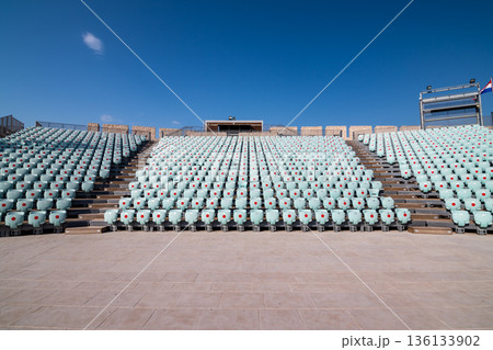 Stage inside of Michaels Fortress in Sibenik, Croatia. Red dots on seats are measures against the COVID disease. 136133902