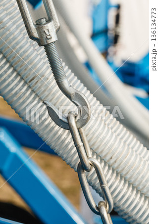 Detailed closeup of steel metal hook Detailed closeup of steel metal hook 136134773