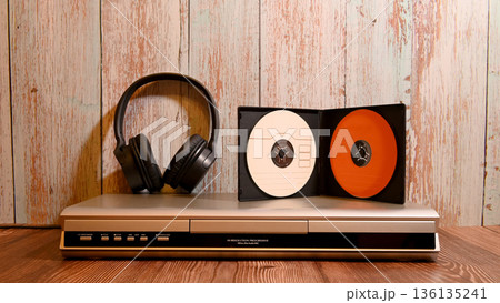 audio system with headphones and discs frontal view 136135241