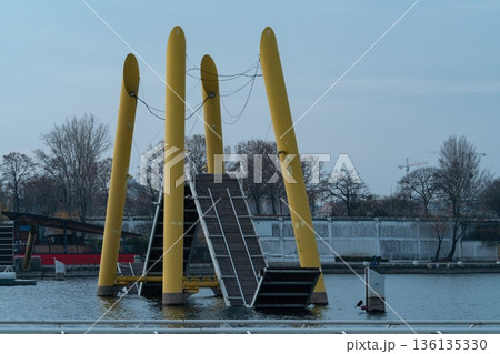 Ponte Cograna drawbridge in Vienna with yellow steel pylons over water 136135330