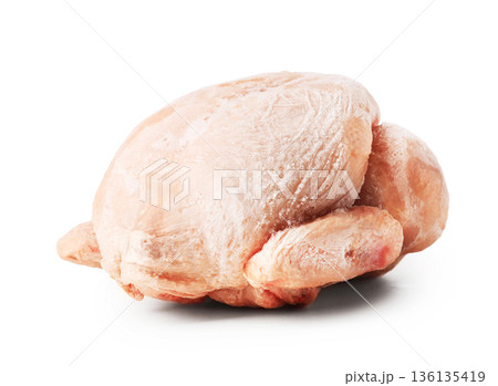 Whole frozen chicken carcass isolated on white background. Raw poultry meat covered with ice crystals and frost ready for cooking Whole frozen chicken carcass isolated on white background. Raw poultry meat covered with ice crystals and frost ready for cooking 136135419