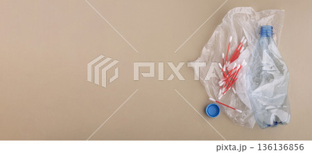 Plastic waste pollution with bottle, bag, and cotton swabs Plastic waste pollution with bottle, bag, and cotton swabs 136136856