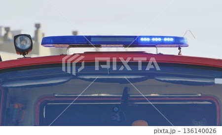 First responder vehicle with flashing blue lights signaling emergency and protection First responder vehicle with flashing blue lights signaling emergency and protection 136140026