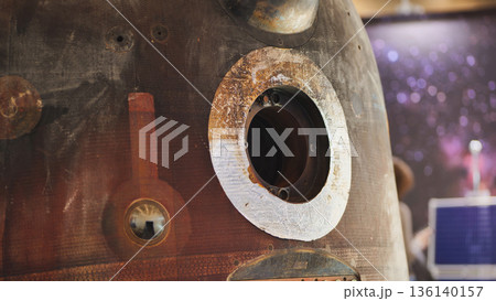 Space capsule module showing reentry burn damage with exposed portal Space capsule module showing reentry burn damage with exposed portal 136140157