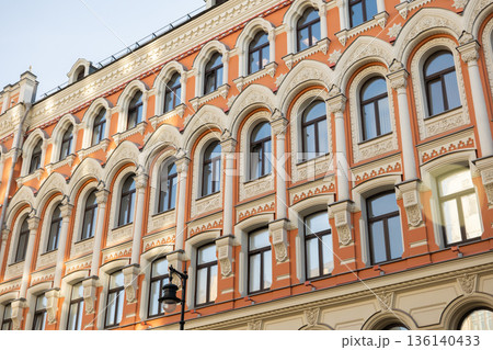 Moscow building facade with ornate architectural details and arched windows Moscow building facade with ornate architectural details and arched windows 136140433