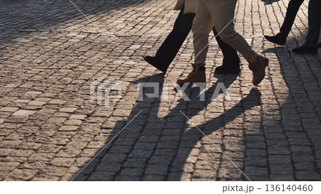 Tourists walking on Red Square cobblestone pavement in Moscow Tourists walking on Red Square cobblestone pavement in Moscow 136140460