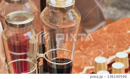Beverage dispensers offering refreshing drinks at a buffet station Beverage dispensers offering refreshing drinks at a buffet station 136140598