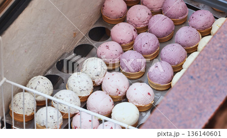 Rows of scoops of ice cream in display freezer in Moscow Rows of scoops of ice cream in display freezer in Moscow 136140601