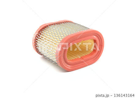 Automotive engine air filter with orange rubber seal and metal mesh on white background 136143164