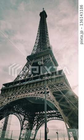 Paris, France - March 15 2023: Gorgeous Eiffel Tower day and night 136143186
