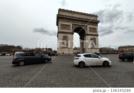 Paris, France - March 15 2023: Gorgeous Arc de Triomphe day and night 136143289
