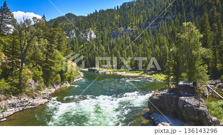 Aerial Rushing River Forest and Rocky Cliffs in Summer Wyoming Aerial Rushing River Forest and Rocky Cliffs in Summer Wyoming 136143296