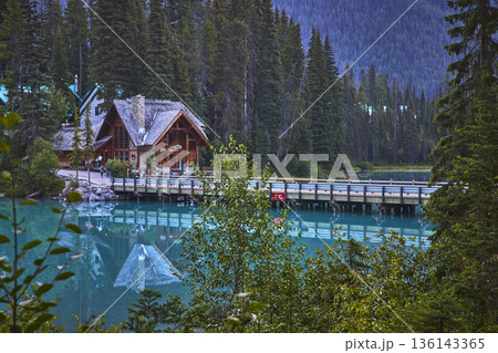 Emerald Lake Lodge Reflected in Turquoise Water with Bridge and Forest at Sunrise Emerald Lake Lodge Reflected in Turquoise Water with Bridge and Forest at Sunrise 136143365