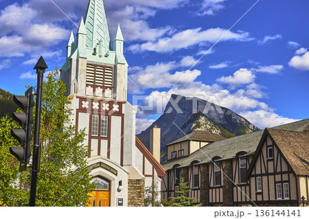 Historic Church and Tudor Architecture with Mountain Backdrop in Town of Banff Canada Historic Church and Tudor Architecture with Mountain Backdrop in Town of Banff Canada 136144141
