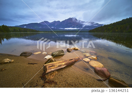 Pyramid Lake Tranquil Water and Mountain Reflections with Rocky Shoreline 136144251