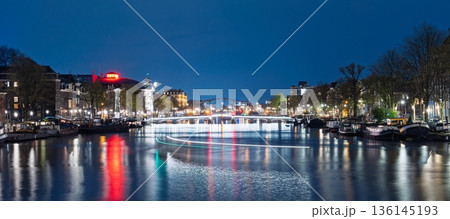 Amsterdam at Night Canals, Bridges, and the Enchanting Glow of the Netherlands 136145193