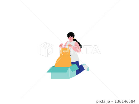 届いた商品の箱を開封する女性 136146384
