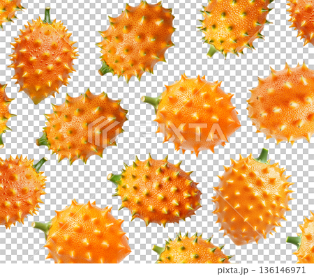 Multiple horned orange kiwano fruits with green tips isolated on white background, concept of exotic fruit freshness Multiple horned orange kiwano fruits with green tips isolated on white background, concept of exotic fruit freshness 136146971