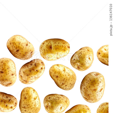 Fresh raw potatoes with skin, scattered and isolated on white background, concept of organic food ingredients 136147010