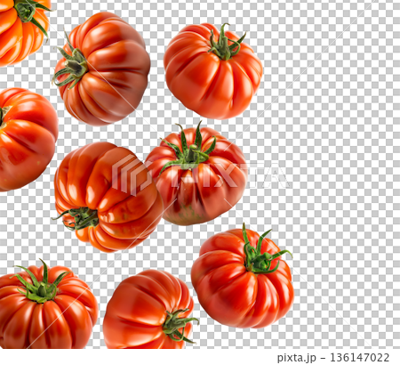 Multiple ripe heirloom tomatoes with ridged textures scattered and on a white background, natural food and healthy eating concept Multiple ripe heirloom tomatoes with ridged textures scattered and on a white background, natural food and healthy eating concept 136147022
