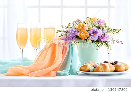 Elegant Table Arrangement with Flowers, Champagne, and Assorted Pastries for Celebration Elegant Table Arrangement with Flowers, Champagne, and Assorted Pastries for Celebration 136147802