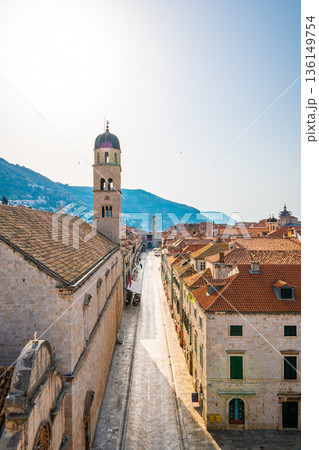 Aerial view of Stradun main street, Dubrovnik old city. Sunny day morning. Aerial view of Stradun main street, Dubrovnik old city. Sunny day morning. 136149754