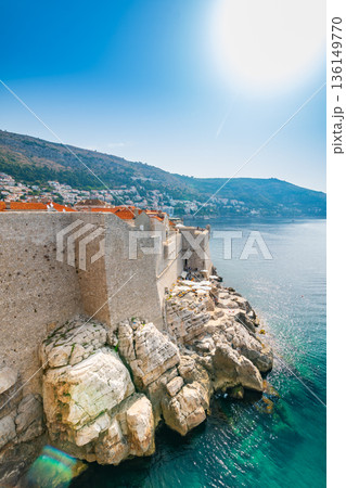 Old city Dubrovnik, Croatia.View of historic city wall above the cliff and adriatic sea. Old city Dubrovnik, Croatia.View of historic city wall above the cliff and adriatic sea. 136149770