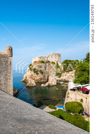 Ancient fort Lovrijenac near old city Dubrovnik. View from city wall. Sunny day, summer weather. Croatia coat near adriatic sea. 136149793