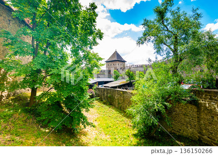 Medieval castle Helfstyn, Czech Republic. Ancient castle in gothic style. Castle walls and interiors, beautiful old tower. Summer weather, blue sky with clouds. Famous trip destination. 136150266
