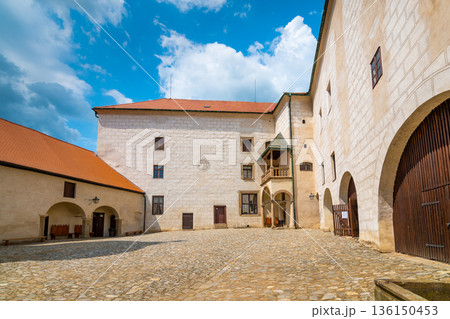 Courtyard of Ledec nad Sazavou Castle, Czech Republic. View from castle tower in summer day. Courtyard of Ledec nad Sazavou Castle, Czech Republic. View from castle tower in summer day. 136150453