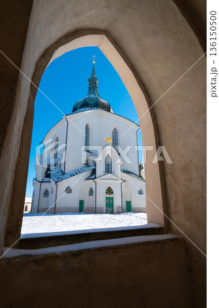 The Pilgrim Church of St. John of Nepomuk on Zelena Hora - Green Mountain, Zdar nad Sazavou, Czech Republic, UNESCO heritage. Winter weather with snow. Sunny frozen day. 136150500