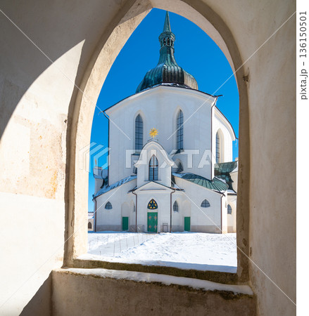 The Pilgrim Church of St. John of Nepomuk on Zelena Hora - Green Mountain, Zdar nad Sazavou, Czech Republic, UNESCO heritage. Winter weather with snow. Sunny frozen day. 136150501