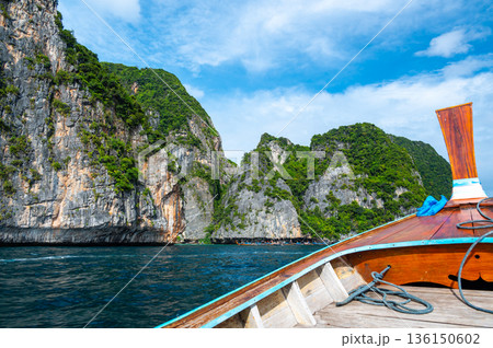 View of limestone rock at Ko Phi Phi islands, Thailand. View from long tailed boat. Exotic and tropic nature, summer paradise. 136150602